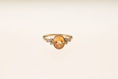 Lot 19 - 9ct gold citrine and diamond ring