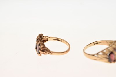Lot 25 - Two 9ct gold garnet dress rings