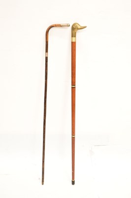 Lot 328 - Reproduction duck 'toper' walking stick and an early 20th century cane