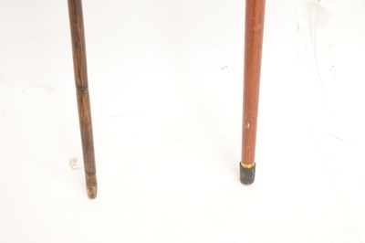 Lot 328 - Reproduction duck 'toper' walking stick and an early 20th century cane