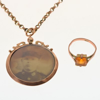 Lot 55 - Double-sided photo locket pendant stamped '9ct'
