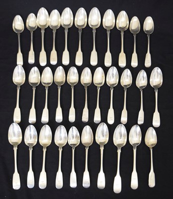 Lot 220 - Quantity of Irish silver Fiddle pattern teaspoons, together with a set of four Scottish teaspoons