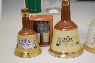 Lot 812 - Three Bells whisky decanters, a selection of miniatures and liquors, etc