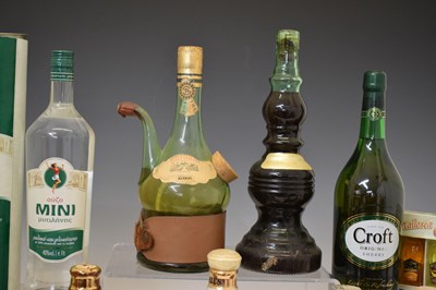 Lot 812 - Three Bells whisky decanters, a selection of miniatures and liquors, etc