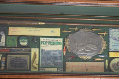 Lot 401 - Cased fishing memorabilia in frame