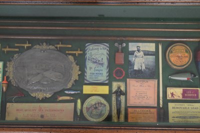 Lot 401 - Cased fishing memorabilia in frame