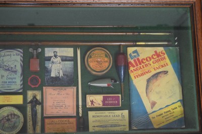 Lot 401 - Cased fishing memorabilia in frame