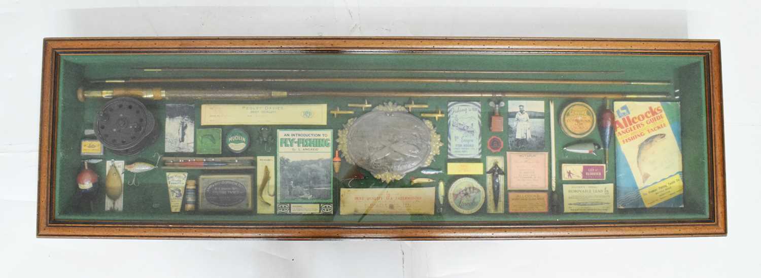 Lot 401 - Cased fishing memorabilia in frame