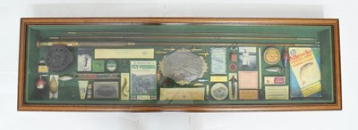 Lot 401 - Cased fishing memorabilia in frame