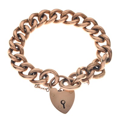 Lot 71 - 9ct gold hollow curb link bracelet with heart-shaped padlock