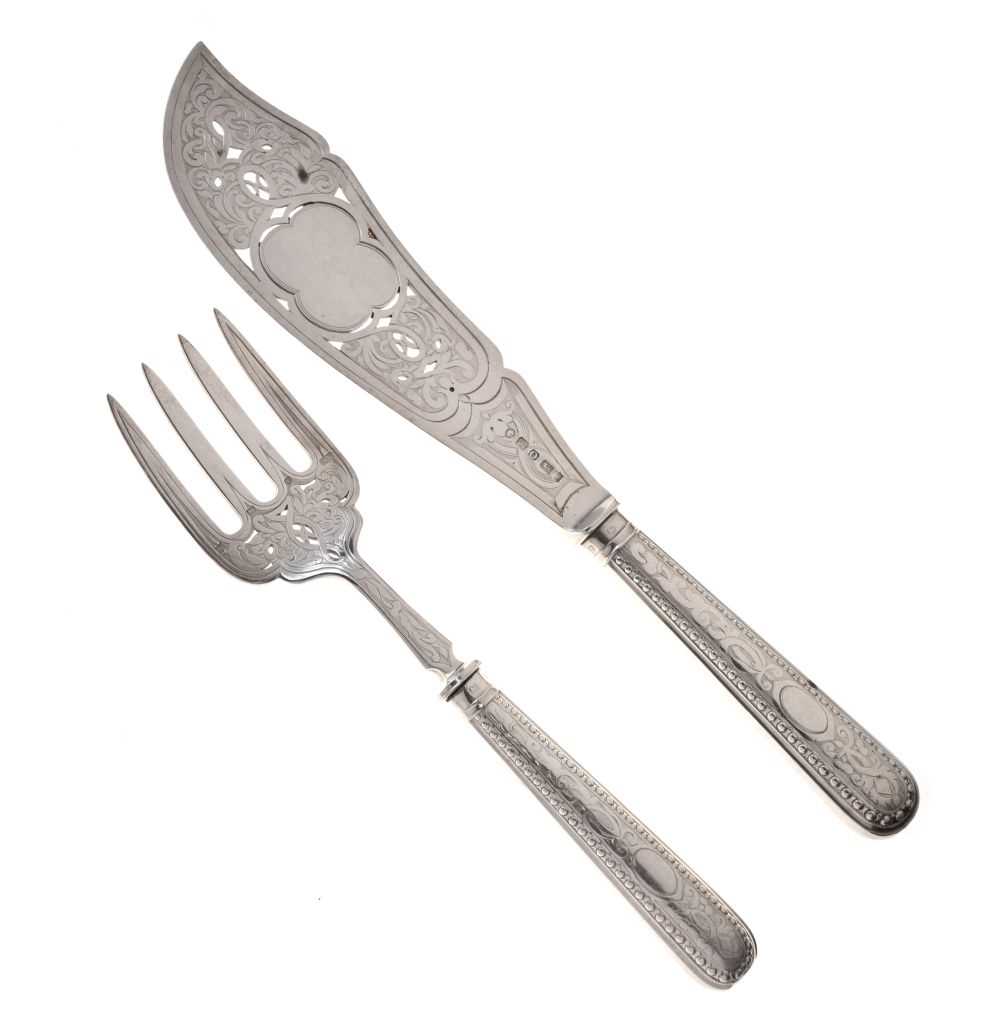 Lot 83 - Victorian silver fish slice and fork with engraved and pierced decoration