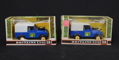 Lot 425 - Britains - Two boxed Farm Land Rovers (9571)