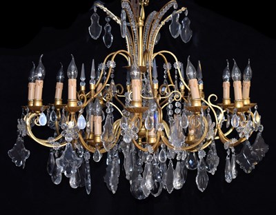 Lot 574 - Gilt metal and cut crystal chandelier