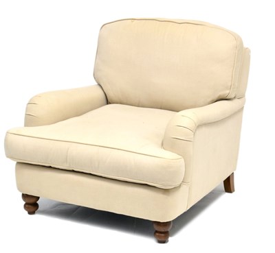 Lot 703 - Cream upholstered easy chair