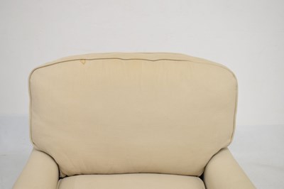 Lot 703 - Cream upholstered easy chair