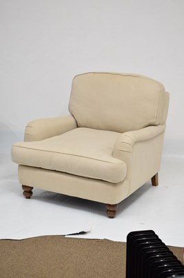 Lot 703 - Cream upholstered easy chair