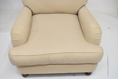 Lot 703 - Cream upholstered easy chair