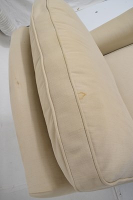 Lot 703 - Cream upholstered easy chair