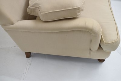 Lot 703 - Cream upholstered easy chair