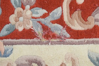 Lot 526 - Chinese claret ground wool rug