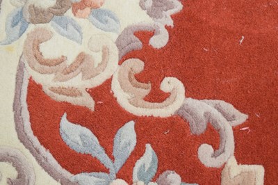 Lot 526 - Chinese claret ground wool rug