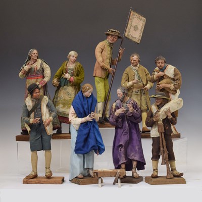 Lot 296 - Nine Neapolitan painted terracotta and limewood Nativity presepio figures