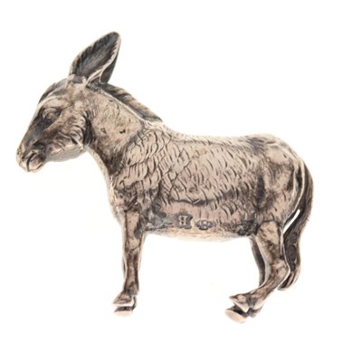 Lot 162 - Cast  white metal figure of a donkey