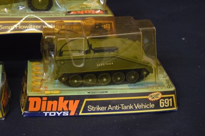 Lot 457 - Dinky Toys - Group of seven diecast model military vehicles