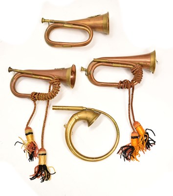 Lot 494 - Three copper and brass military bugles