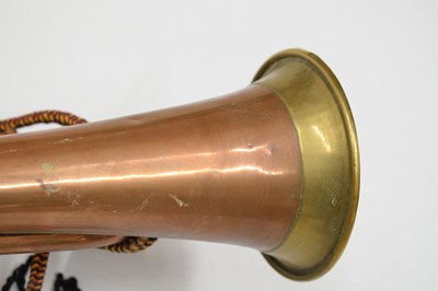 Lot 494 - Three copper and brass military bugles