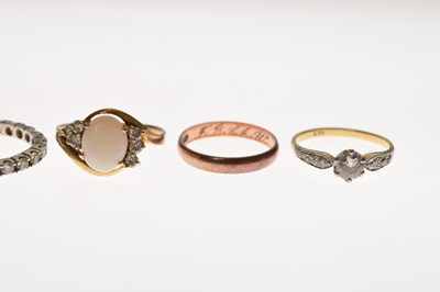 Lot 36 - Three assorted yellow metal rings and one other