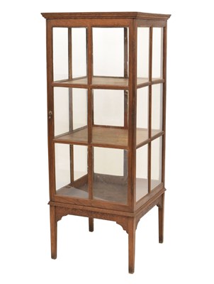 Lot 676 - Oak glazed display cabinet