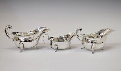 Lot 199 - Pair of Edward VII silver sauceboats together with a similar smaller silver sauceboat