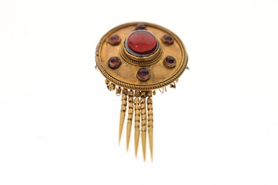 Lot 42 - Victorian brooch set garnet-coloured cabochons and with tassel drops