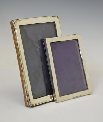 Lot 161 - Silver-mounted easel photograph frame, together with a smaller silver-mounted photo frame