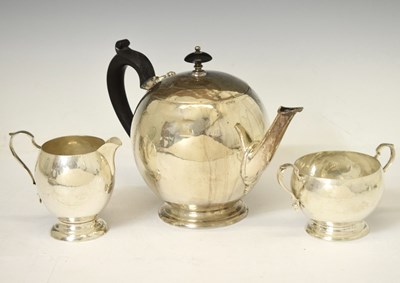 Lot 245 - Early 20th century American white-metal Colonial style three-piece tea set by Watson Company