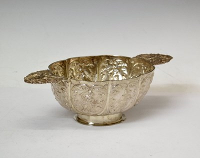 Lot 246 - 19th century Dutch export white-metal two-handled brandy bowl of oval lobed form