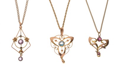 Lot 51 - Three Art Nouveau stone set pendants