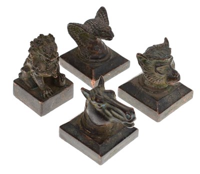 Lot 289 - Four Chinese bronze animal desk seals