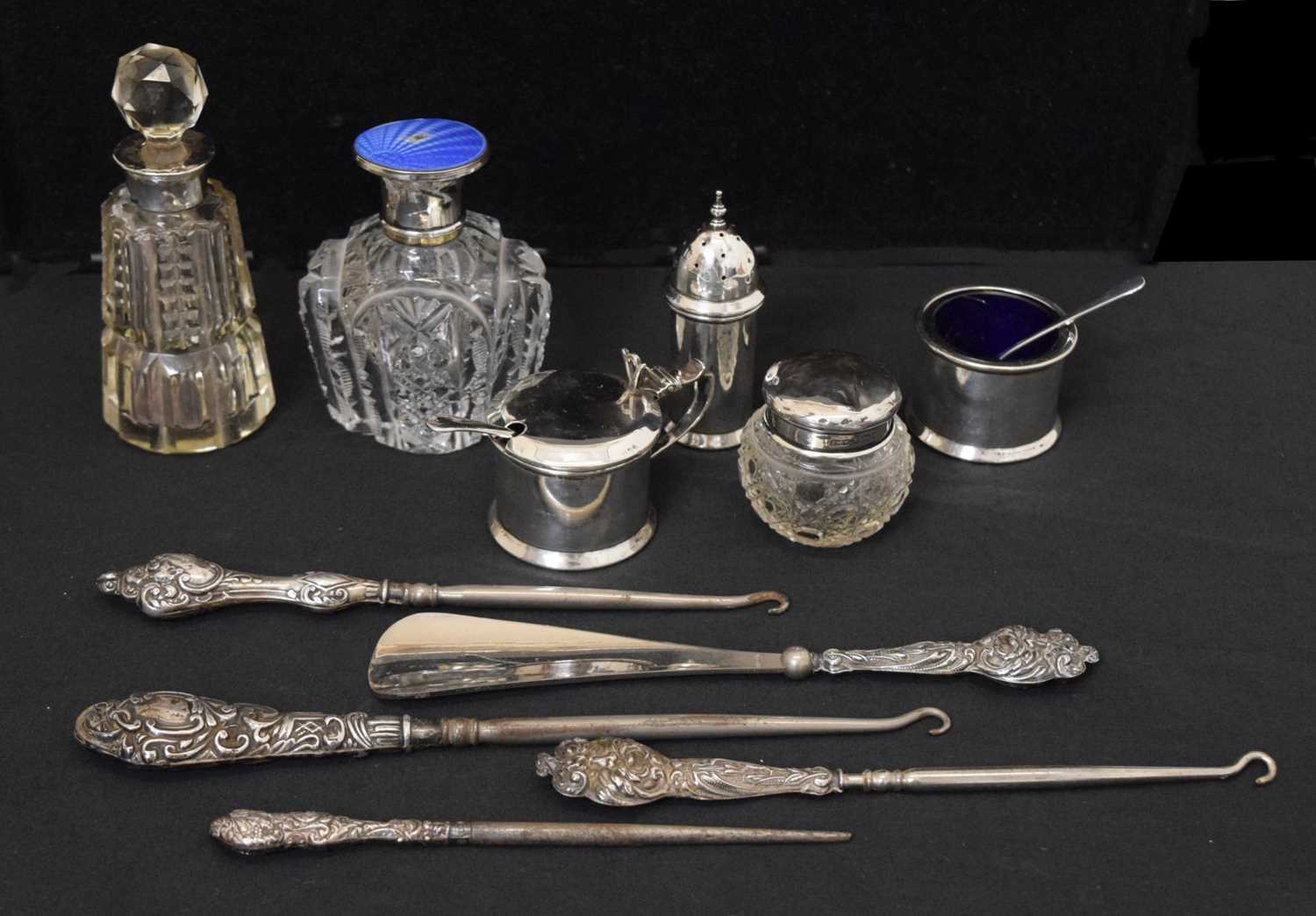 Lot 143 - Quantity of silver capped dressing requisites, silver handled button hooks, etc