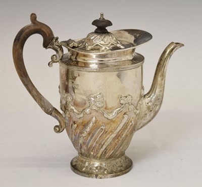 Lot 238 - Victorian silver coffee pot with repousse decoration