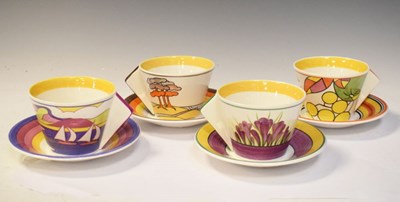 Lot 310 - Clarice Cliff limited edition ceramics - Set of four 'Taking Tea with Clarice' cups and saucers