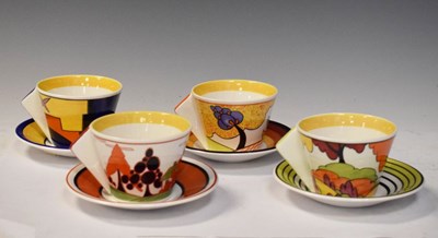 Lot 311 - Clarice Cliff limited edition ceramics - Set of four 'Taking Tea with Clarice' cups and saucers