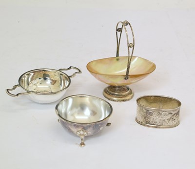 Lot 186 - Elizabeth II silver tea strainer and stand, an Edward VII silver mounted Abalone basket, etc