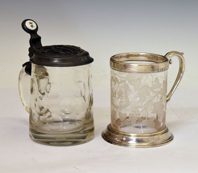 Lot 192 - Victorian silver-mounted glass mug and a pewter-mounted lidded glass tankard