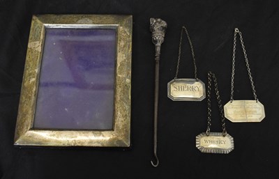 Lot 216 - Edward VIII silver photograph frame, three wine/decanter labels, etc