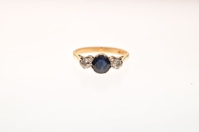 Lot 24 - Sapphire and diamond three-stone ring