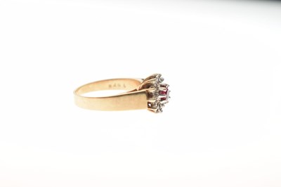 Lot 23 - 9ct gold ruby and diamond cluster ring