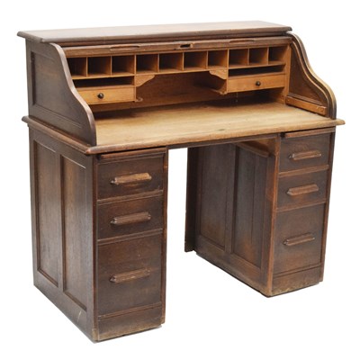 Lot 499 - Early 20th century oak tambour-top twin pedestal desk