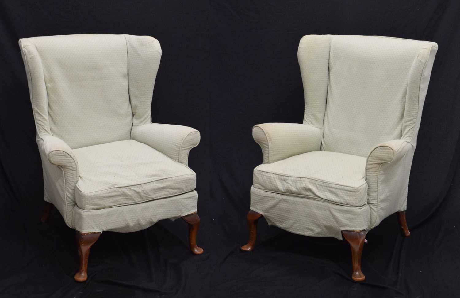 Lot 698 Pair of loose covered wing armchairs
